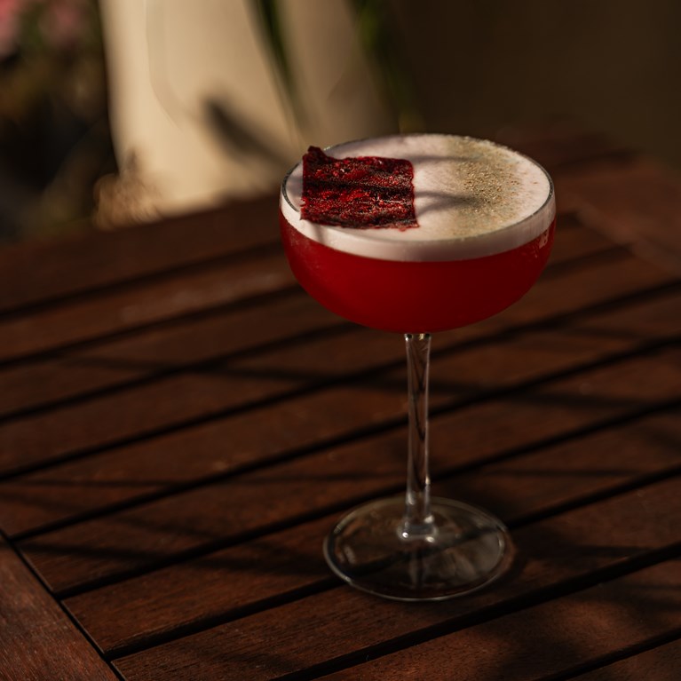 Side profile of single cocktail on table dim lighting Hersonissos