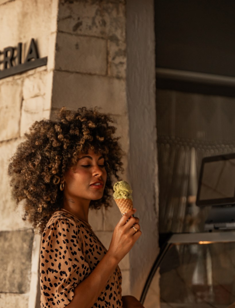 Woman Enjoying Gelato at Cook's Club Adakoy